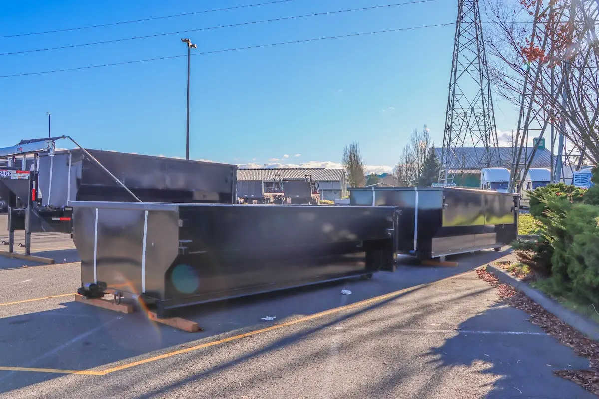 Roll-off dumpster ready for waste disposal at job site for Concrete Dumpster Rental in Bloomsburg